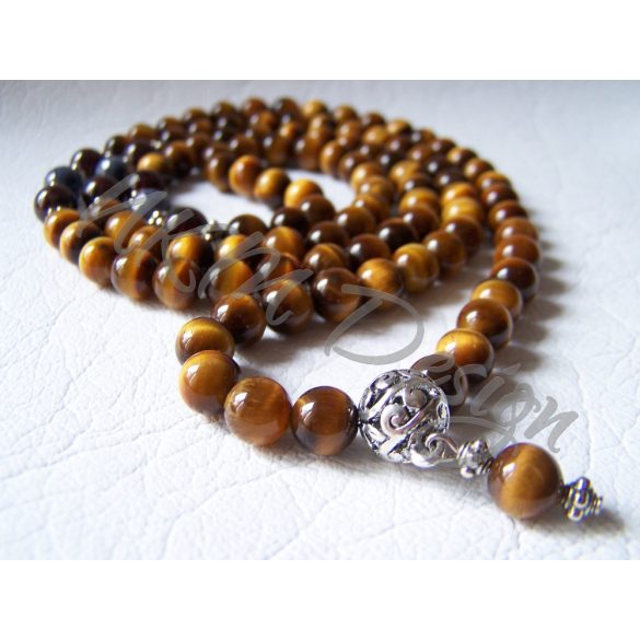 Mala tigrisszemmel, zafírral, vörös gránáttal